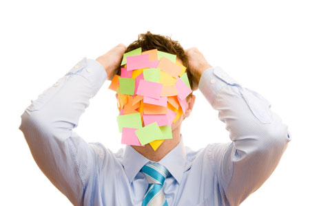 A Digital Project Manager who's face is covered in post-it notes